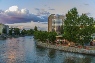 Herrmann beach bar on the Danube Canal in the evening sun, near the Urania observatory, Vienna,