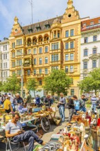 Antique and flea market, on the Chain Bridge south of the Naschmarkt, behind the historic facades