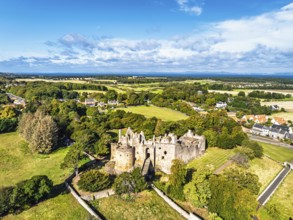 Ruins of Dirleton Castle & Gardens from a drone, Dirleton, East Lothian, Scotland, UK