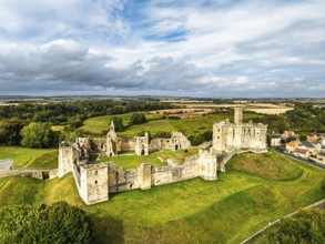 Warkworth Castle over River Coquet from a drone, Warkworth, Northumberland, England, United Kingdom
