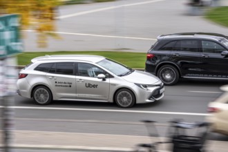 Uber rental car, drives past taxis, Düsseldorf-Bilk train station, taxi stand, competition, North