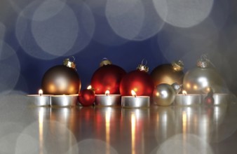 Still life with Christmas tree balls and candles, Germany