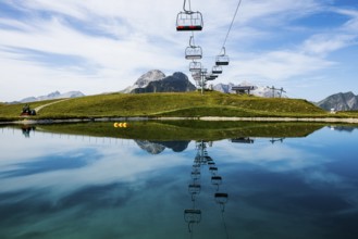 Mountain landscape with reservoir and chairlift, Saloberkopf, Warth, Bregenzerwald, Vorarlberg,