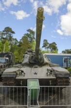 Disused US battle tank type M60 A3 with long cannon in the Point Alpha open-air museum on the
