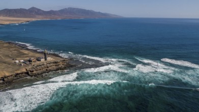 Aerial view of Faro Punta de Jandia lighthouse at the southern tip of Jandia peninsula, in the
