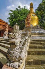 Golden stupa Buddhist element building symbol for Buddha and his teaching Dharma, in the foreground