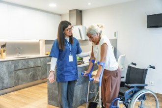 Home nurse assisting a senior woman using crutches to walk, providing support and physical therapy