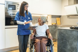 Professional nurse in uniform explaining medical information to an elderly woman sitting in a