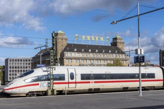 ICE train on track 1 in Essen main station, view of the city center, Handelshof building with Essen