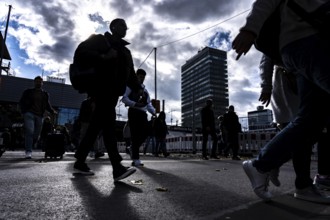 Passers-by in downtown Essen at the main train station, North Rhine-Westphalia, Germany
