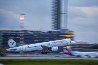 Freebird Airbus A320, taking off from Düsseldorf Airport, Air Traffic Control Tower, North