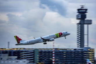 TAP Air Portugal, Embraer E195AR taking off from Düsseldorf Airport, Air Traffic Control Tower,