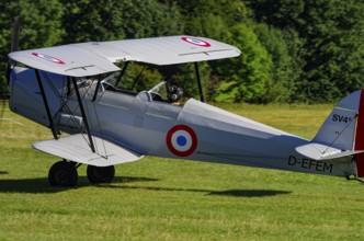 A double-decker Stampe-Vertongen SV-4B with registration D-EFEM during a flight demonstration as