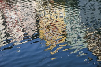 Reflection of the old houses on the Neckar front, the Neckar river, background picture, old town of