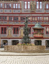 Market square with town hall and Neptune fountain with Neptune and trident from the Renaissance,