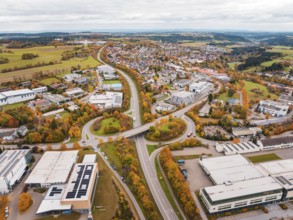 City panorama with street and buildings in autumn colors seen from a bird's eye view, Dornstetten,