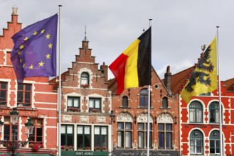 Historic houses on the market square in the old town of Bruges, Grote Markt, former guild houses,