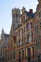 Historic houses in the old town of Bruges with belfry behind it, UNESCO World Heritage Site,