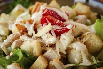 Classic Caesar salad, close-up, natural light, selective focus, horizontal