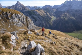 Two hikers on hiking trail, hiking to Gamsjoch, down the Ahornboden valley, eastern Karwendel,