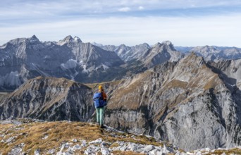 Female hiker on hiking trail, hiking to Gamsjoch, behind Laliderer Spitze, eastern Karwendel,