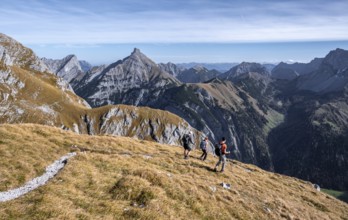 Three hikers on hiking trail, hiking to Gamsjoch, eastern Karwendel, Tyrol, Austria