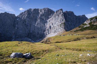 Dreizinkenspitze and Laliederer Wand, large rock face with meadows in the foreground under blue