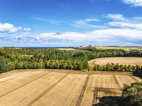 Farms and Fields over Ayton Castle from a drone, Ayton, Eyemouth, Scottish Borders, Scotland, UK