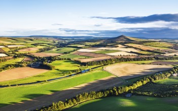 DeFields and Farms over River Teviot and Minto Crags from a drone, Roxburghshire, Scottish Borders,