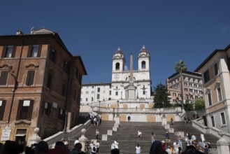 Spanish steps leading up to Trinità dei Monti church, obelisk in the middle, Rome, Italy