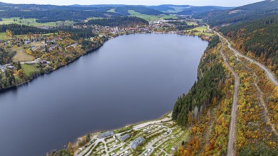 Titisee in the Black Forest around autumn. The landscape around the lake is in bright autumn colors