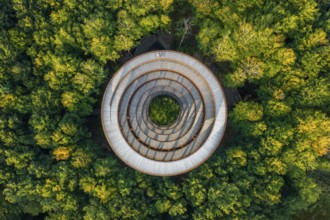 Aerial view over 45-meter-tall hyperboloid observation tower in forest near Gisselfeld monastery at