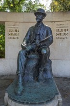 Statue of Emile Claus, Emiel Claus, Belgian Luminist painter in the Citadelpark of the city Ghent,