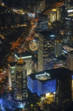 Aerial view over illuminated skyscrapers in Lujiazui financial district from Shanghai Tower