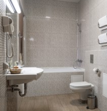 Fine hotel bathroom interior in beige and white color