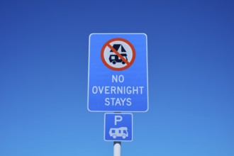 Road sign banning camping under clear blue sky, Lake Pukaki Viewpoint, Pukaki, Canterbury, South