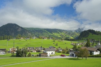 View of the village of Embach in the province of Salzburg and the surrounding alpine landscape,