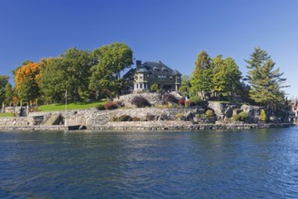 House on a small island in the Saint Lawrence River, 1000 Islands Park, on the borderline the