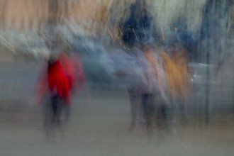 Abstract of people waiting for traffic lights to change captured using ICM intentional camera