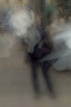 Abstract of a man waiting for tarffic lights to change captured using ICM intentional camera