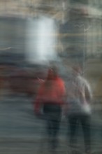 Abstract women waiting for traffic lights to change captured using ICM intentional camera movement