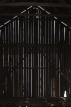 Silhouette of barn wall boards from inside, Junkarsborg, Finland