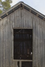 Entrance to a abandoned wood barn, Junkarsborg, Finland