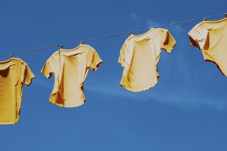 T-shirts hanging from a rope in Arnhem, the Netherlands