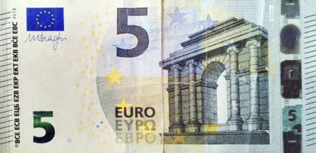 A 5 euro paper banknote issued by the European Central Bank. This banknote is used in financial
