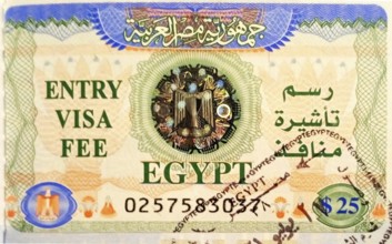 Tourist visa with stamp for entry to mainland Egypt, pasted into the passport at the airport of