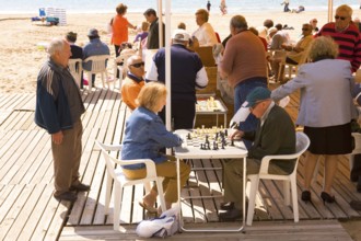 Social game, seaside promenade, Benidorm, Spain
