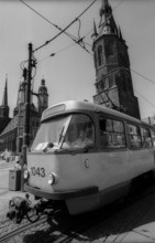 Germany, Halle, 5.8.1992, Hall/ Market with tram, Red Tower, left: St. Mary's Church