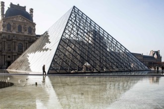 Glass pyramid at Louvre Museum (Museé du Louvre). Paris, France. 29.01.2009