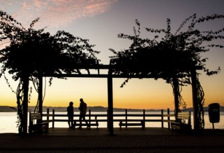 Deck on the sidewalk of Beira Mar Norte Avenue at sunset. Florianopolis, Santa Catarina, Brazil